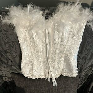 Corset size small…adjustable in the back to make bigger if needed $30